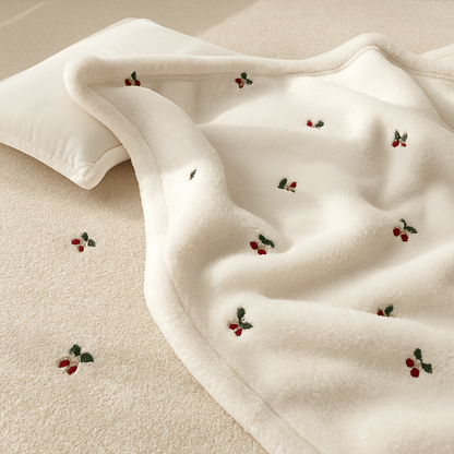 couverture bébé avec des motifs de cerise